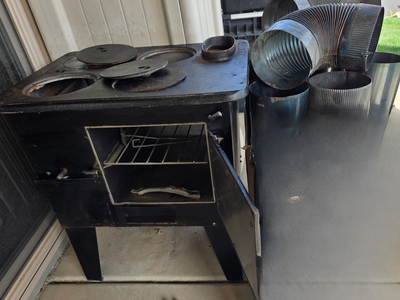 Never Used Wood Burning Cast Iron Camp Stove - $95
