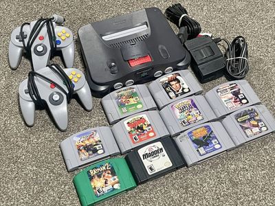 Nintendo 64 (N64) Console Bundle with 2 Controllers, Power, A/V & 9 Games (Mario, 007, Pokémon)