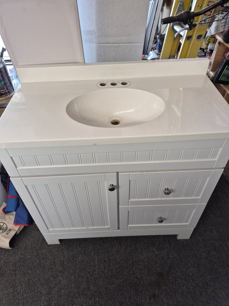 White Beadboard Bathroom Vanity Cabinet with Cultured Marble Top and Integrated Sink