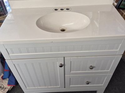 White Beadboard Bathroom Vanity Cabinet with Cultured Marble Top and Integrated Sink