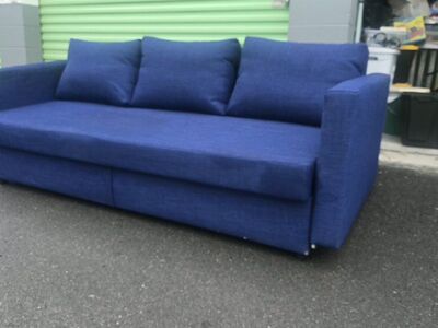 IKEA Futon pull out sofa, medium blue. 9 mo. old.