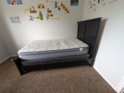 Twin bed frame with mattress and box spring