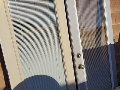 A Door And Sidelight With Blinds