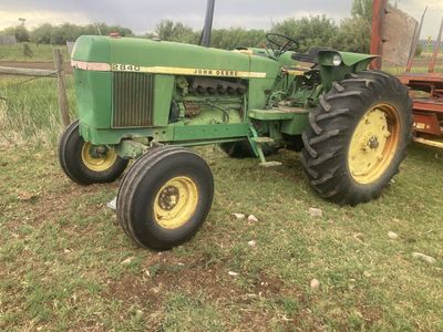John deer 2840 and a new Hollander 1033 bale wagon