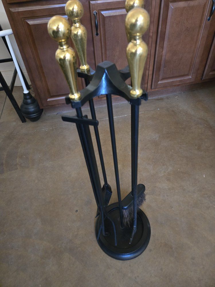 Fireplace cast iron tool set with solid brass handles