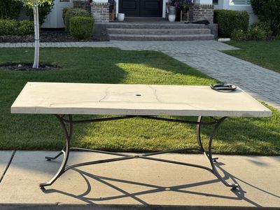 Outdoor Patio Dining Table with Wrought Iron Base & Stone Look Top - Durable & Stylish