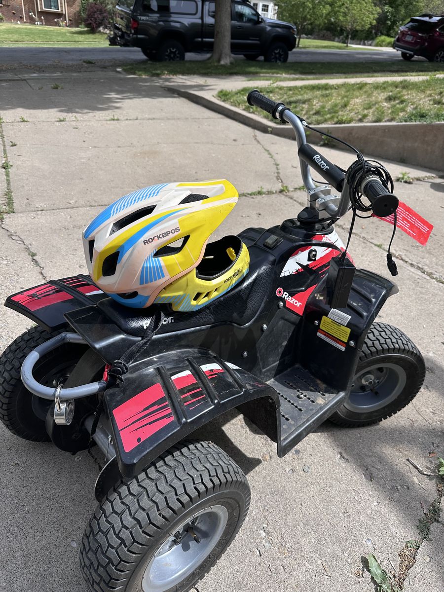 Kid's battery powered quad with helmet