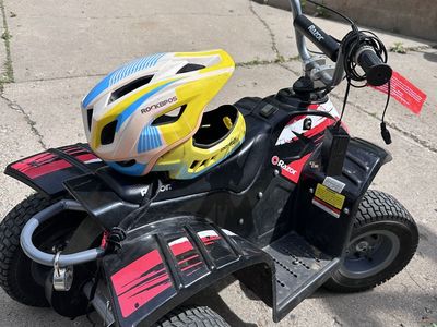Kid's battery powered quad with helmet