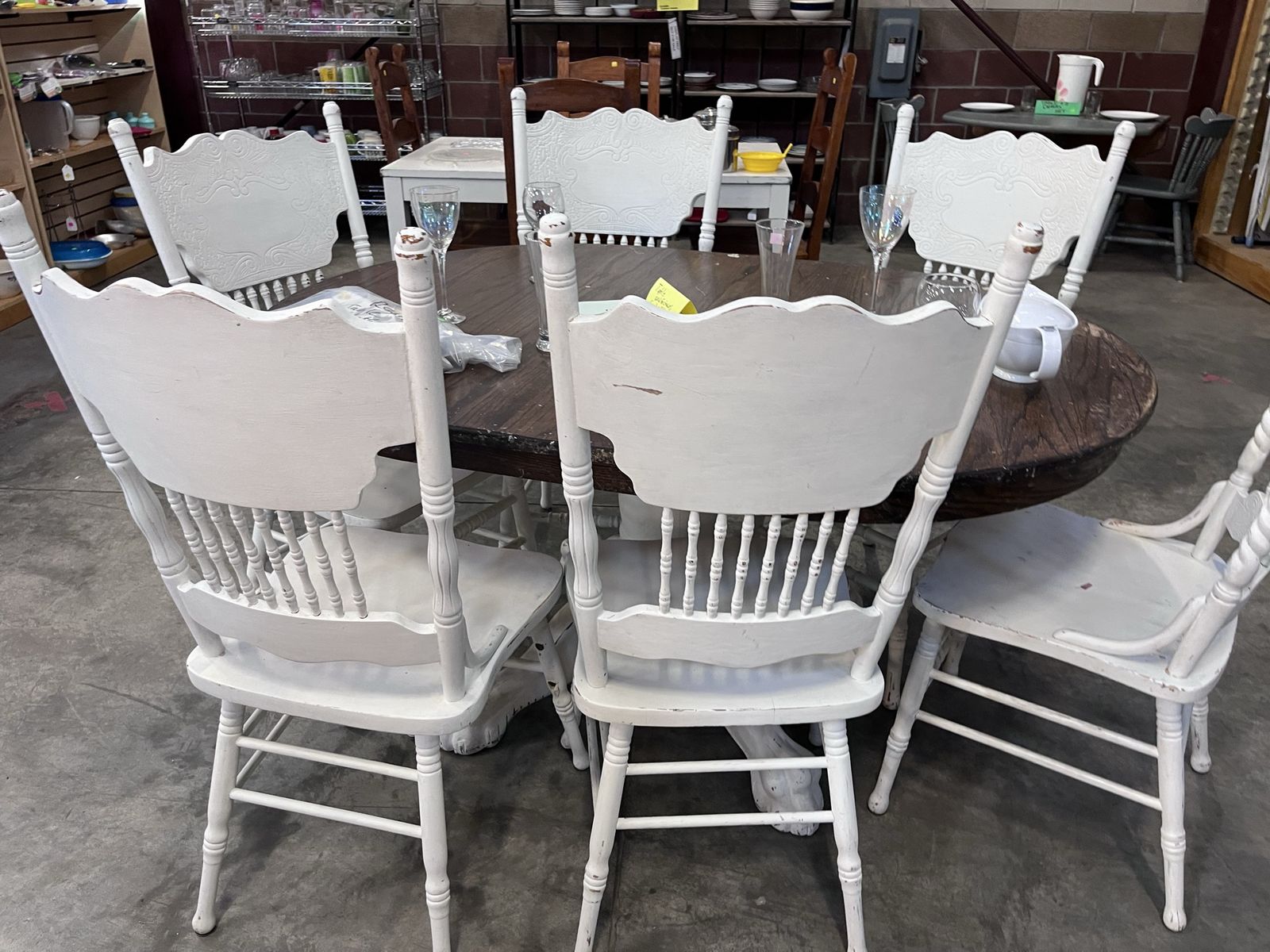 Press back chairs and claw foot table 