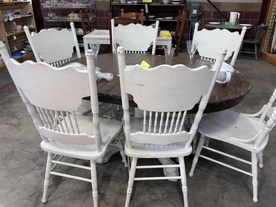 Press back chairs and claw foot table