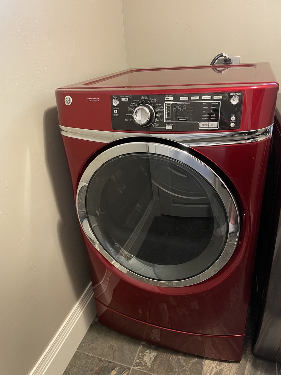 GE Ruby Red Electric Front-Load Dryer - RightHeight Pedestal Design