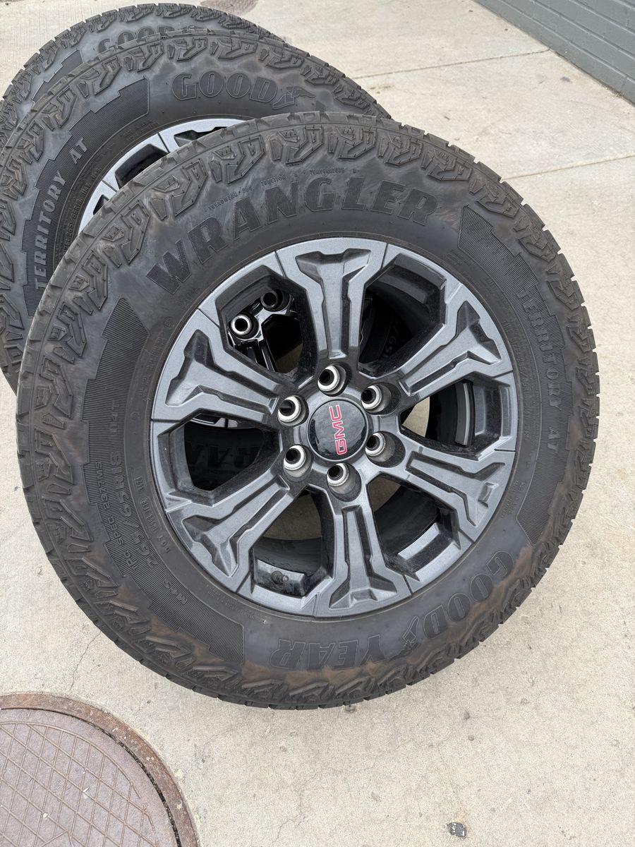 18” OEM GMC wheels and tires