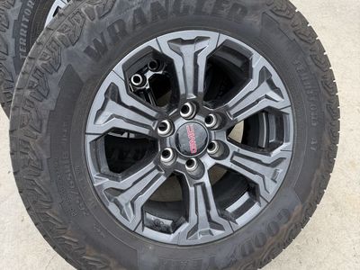 18” OEM GMC wheels and tires