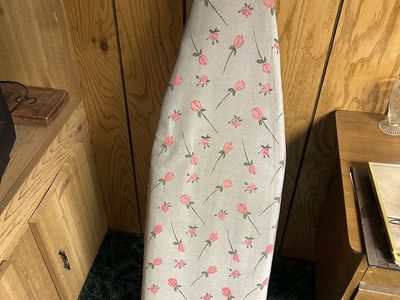 Folding ironing board