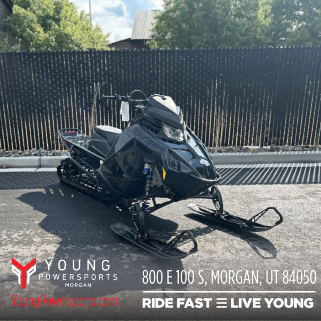 2026 Polaris® 850 RMK Khaos 155 Gloss Black / Blue Dusk