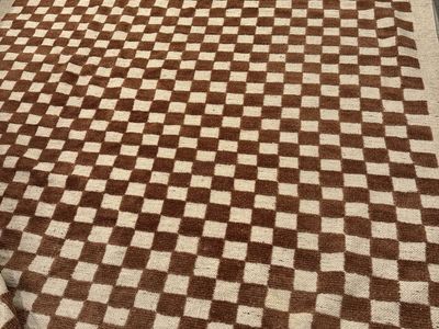 Brown checkerboard rug