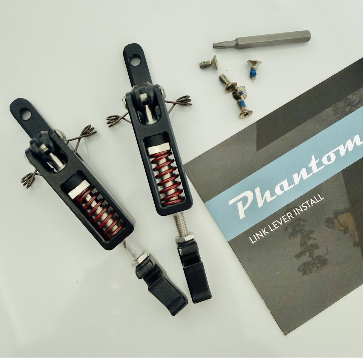 Phantom link levers with red springs