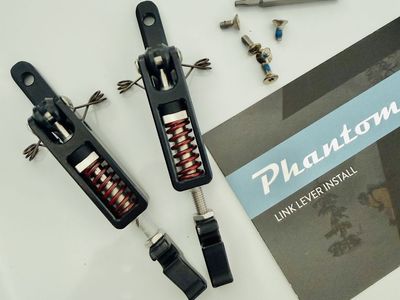 Phantom link levers with red springs