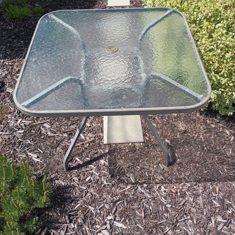 patio table + 4 chairs
