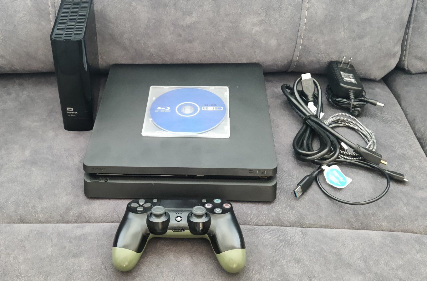 Sony PlayStation 4 Slim Console with Controller jb-bd disc and External Hard Drive