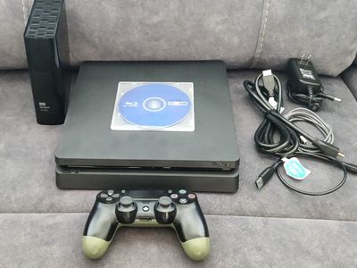 Sony PlayStation 4 Slim Console with Controller jb-bd disc and External Hard Drive