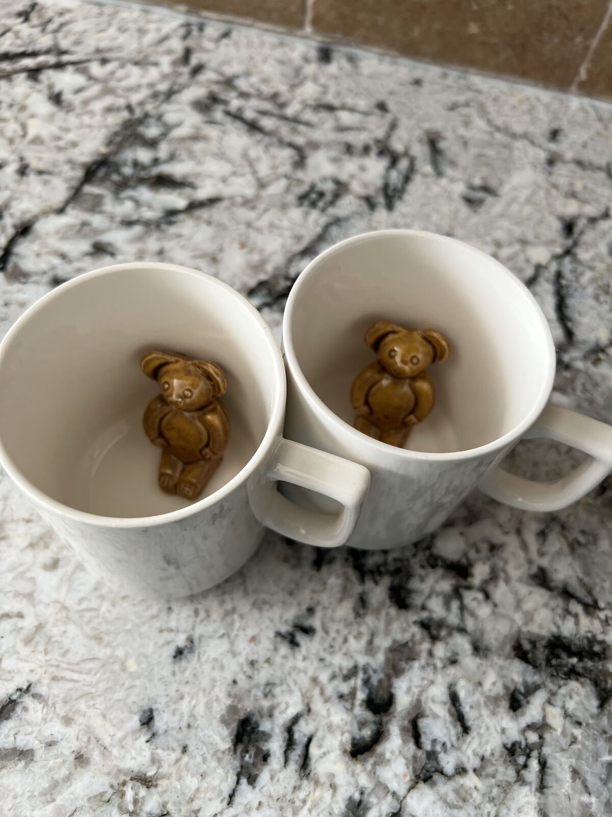 Bear inside each Mugs