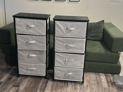 Two gray organizers with four drawers each