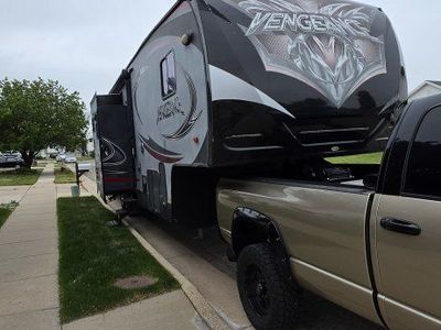 Forest River Vengeance 320a Toy Hauler Great Condition 13ft 4" garage