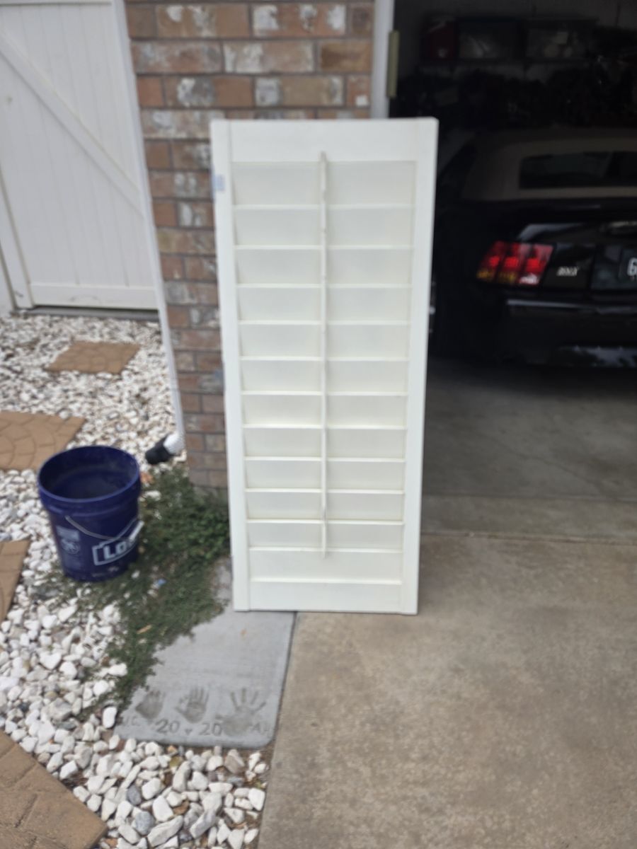 2 sets of white shutters