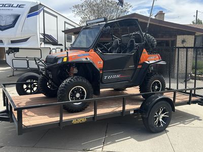Polaris RZRs and 14’ trailer