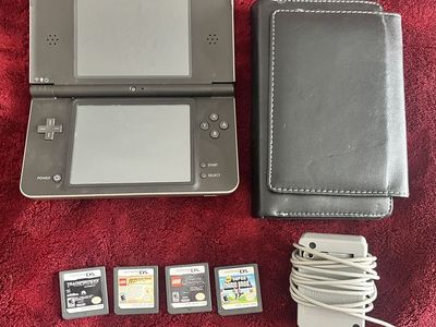 Bronze DSI XL with games and case