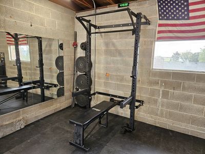 PRX Profile Pro 90" 1000 lb folding squat rack with folding bench and catch arms, pull up/kipping bar and pulley system