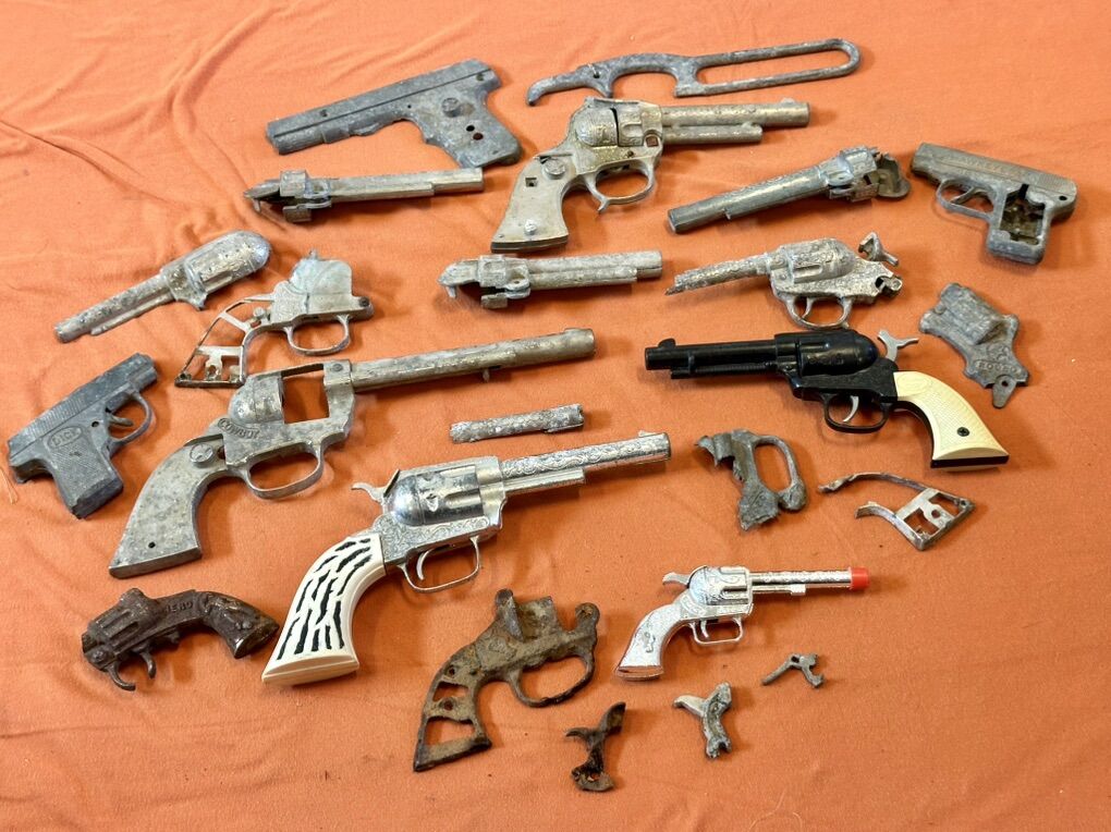 Collection Of Vintage Toy Guns In Various Stages