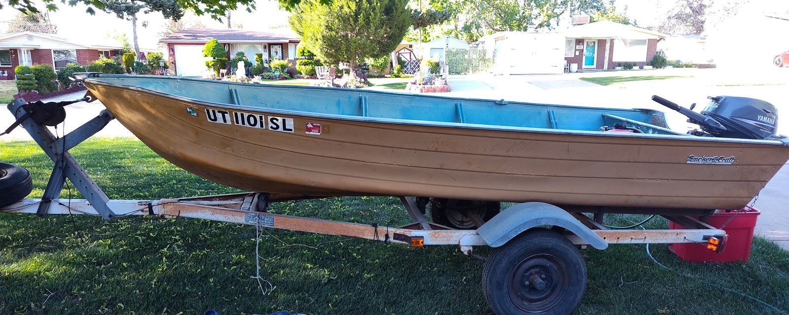 14' Fishing boat and trailer, and 15 hp Yamaha motor
