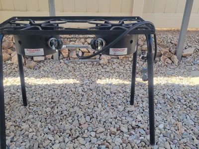 The Camp Chef Explorer Two-Burner Stove is durable, versatile, and ready for your next outdoor cookout or camping trip.