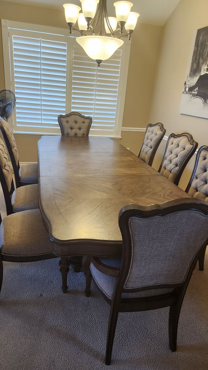 Beautiful wooden table with 8 comfortable chairs