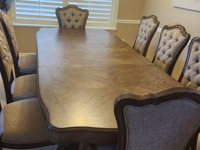 Beautiful wooden table with 8 comfortable chairs