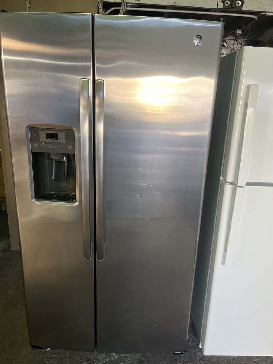 Great GE side by side refrigerator,free delivery