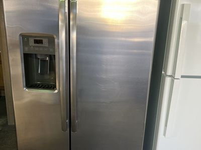 Great GE side by side refrigerator,free delivery