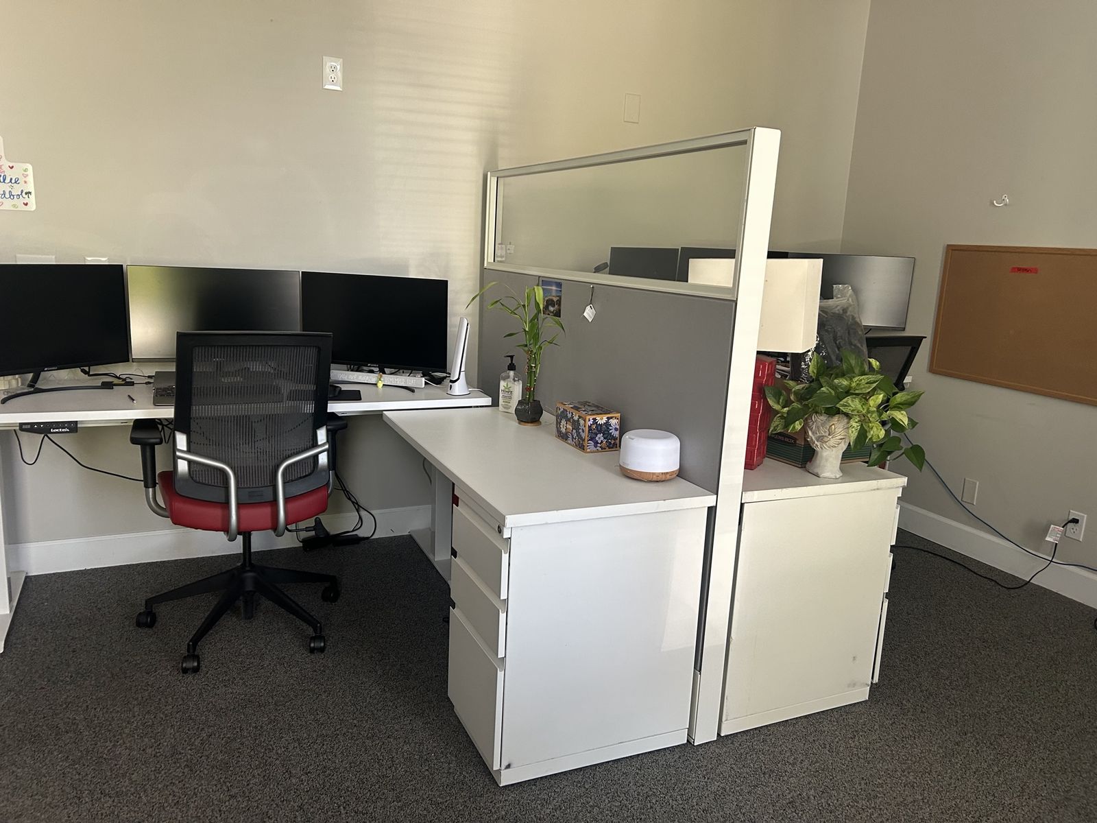 cubicle with stand-up desk. (4)