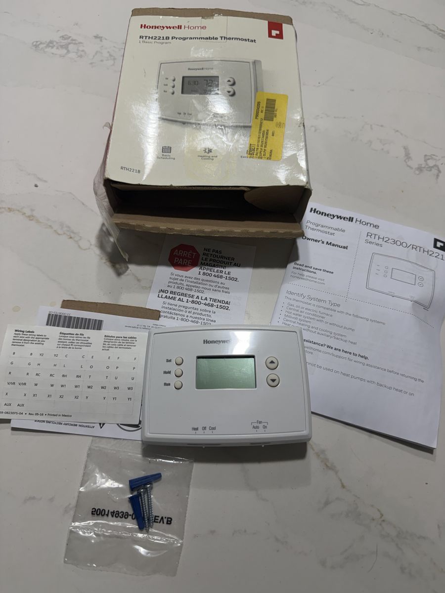 Honeywell Home RTH221B Programmable Thermostat for Heating & Cooling Systems