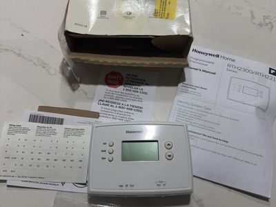 Honeywell Home RTH221B Programmable Thermostat for Heating & Cooling Systems