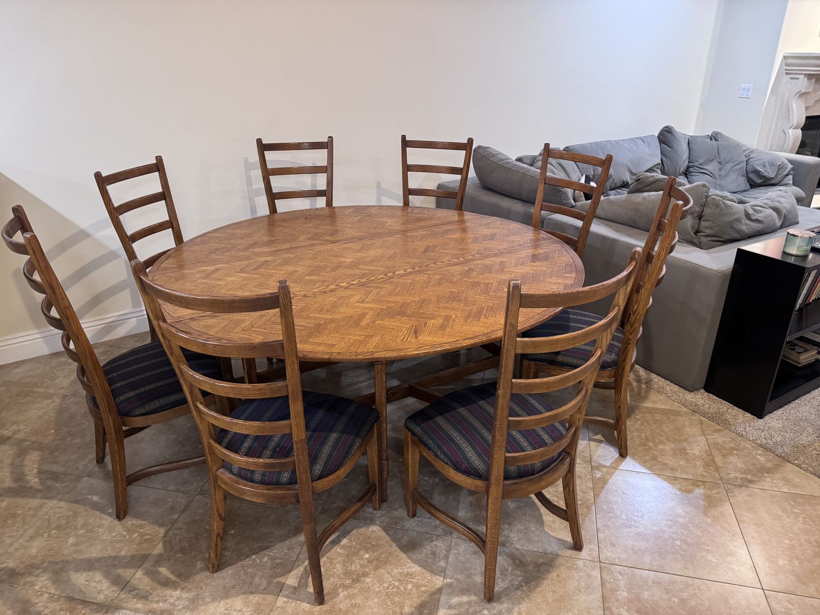 Round Dining Room Table perfect for all 8 people to be included in conversation.