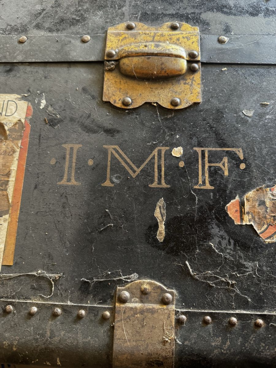 Antique Black Steamer Trunk with Initials I.M.F. - Vintage Travel Chest with Brass Hardware & Stickers