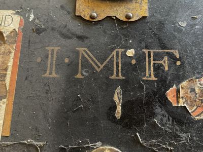 Antique Black Steamer Trunk with Initials I.M.F. - Vintage Travel Chest with Brass Hardware & Stickers