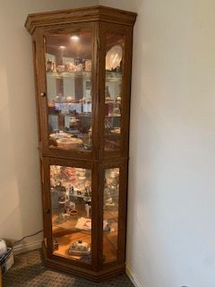 Corner Curio Cabinet - $75