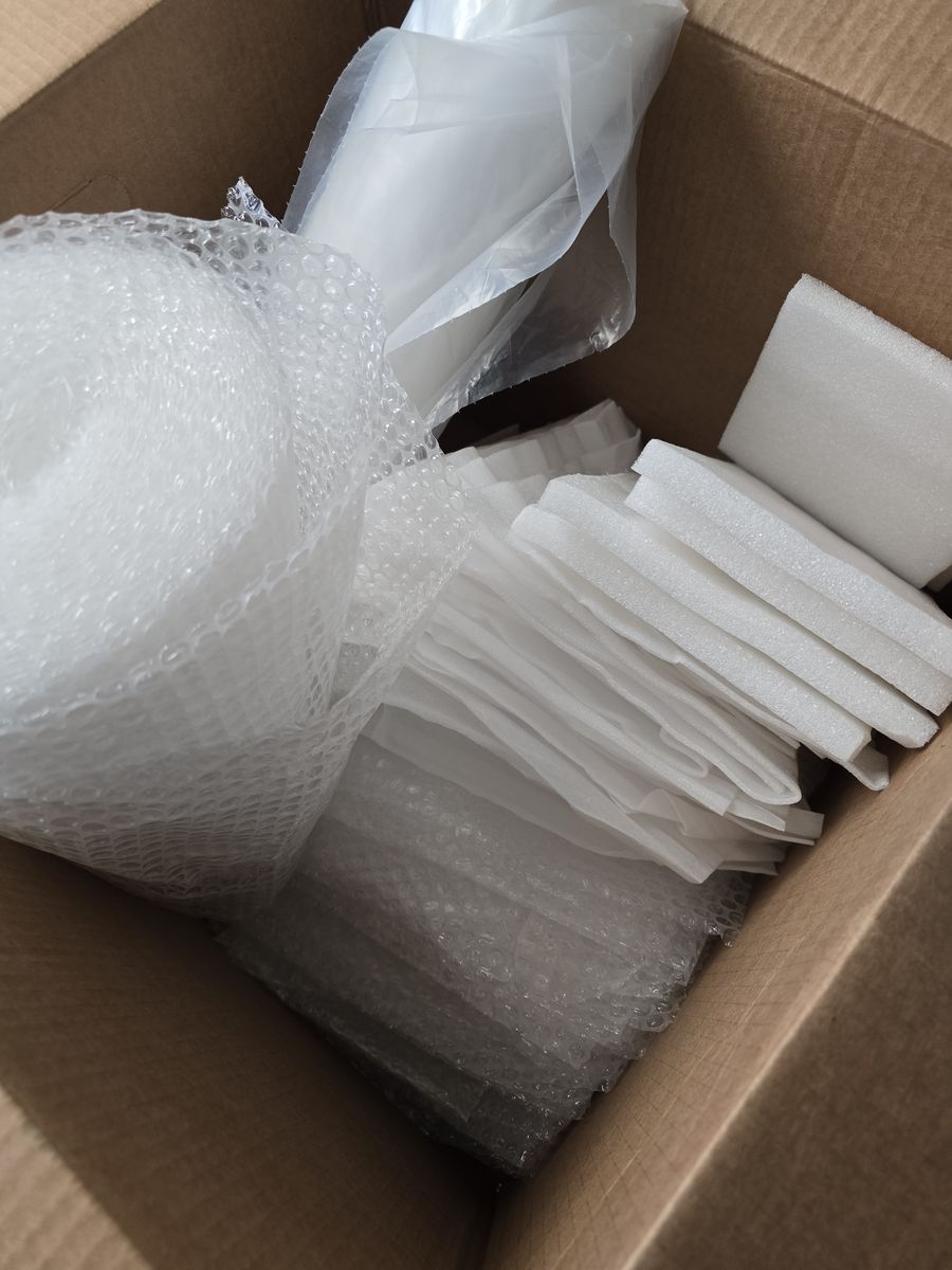 Clean, Assorted Packing Materials Bubble Wrap and Foam Sheets