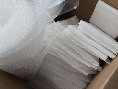 Clean, Assorted Packing Materials Bubble Wrap and Foam Sheets
