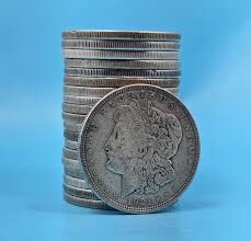 Morgan / Peace Silver Dollars.  .77 oz silver content