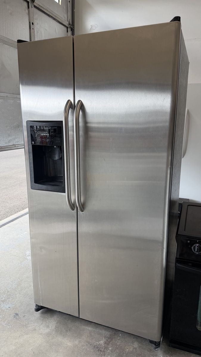 GE Stainless Steel Side-by-Side Refrigerator with Ice And Water Dispenser